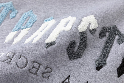 Survêtement gris décodé