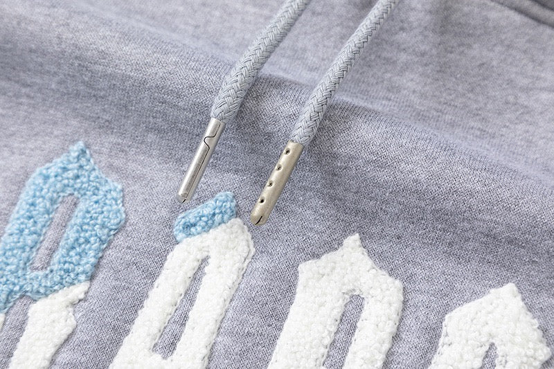 Survêtement gris décodé