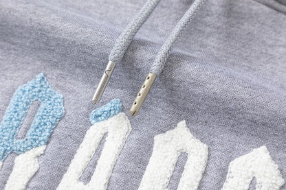 Survêtement gris décodé