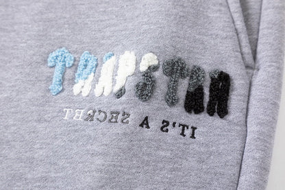 Survêtement gris décodé