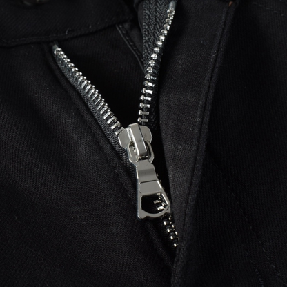 Jean noir déchiré Amr Bandana