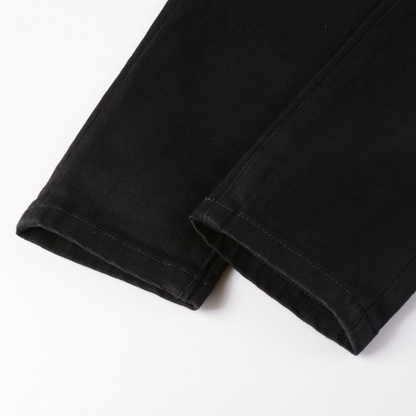 Jean noir déchiré Amr Bandana