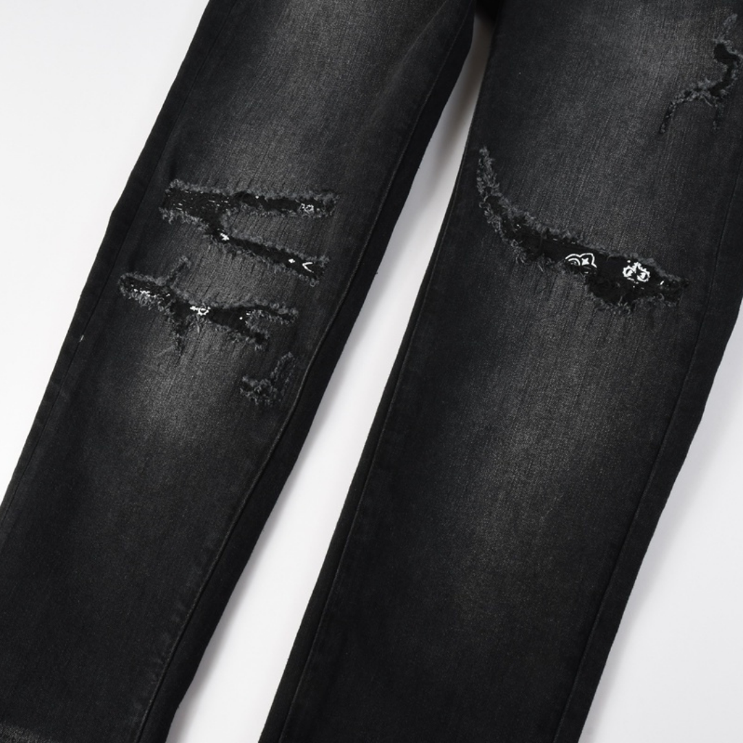 Jean noir déchiré Amr Bandana