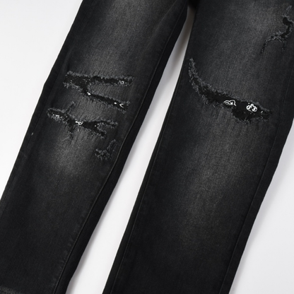 Jean noir déchiré Amr Bandana