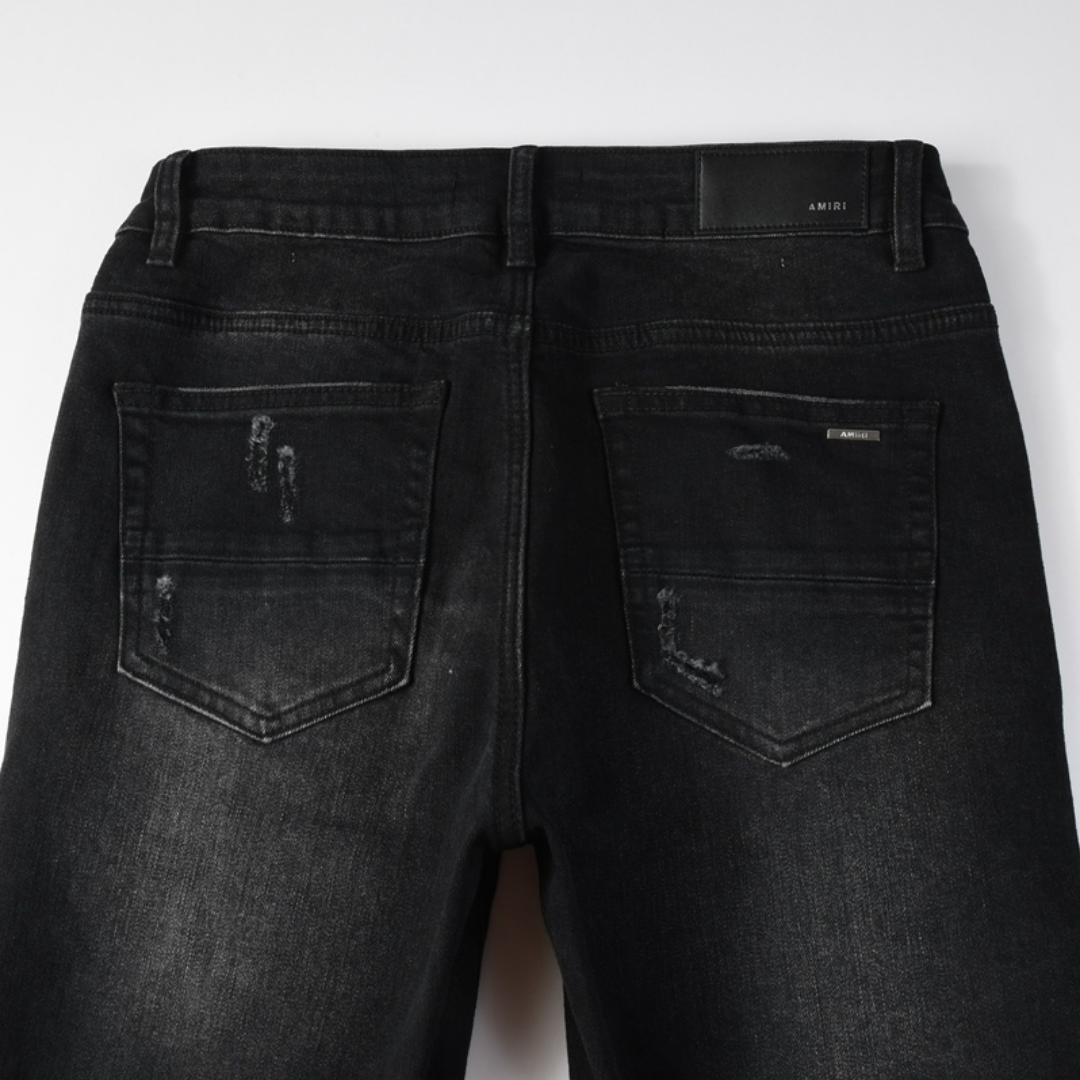 Jean noir déchiré Amr Bandana