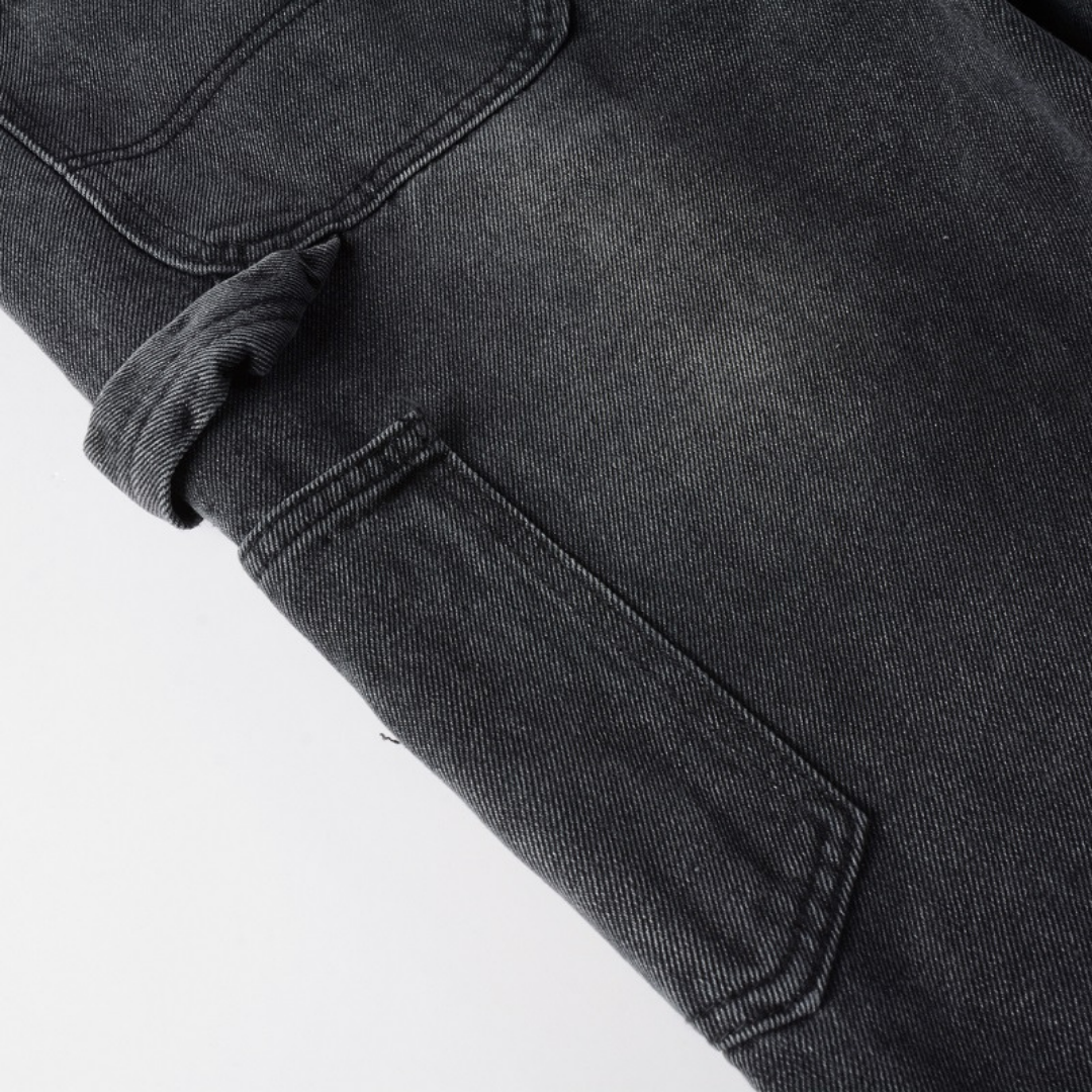 Jean évasé à patchs noirs Amr