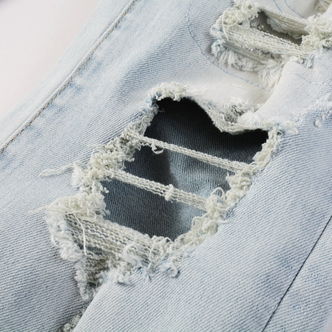 Jean Amr déchiré bleu clair à losanges