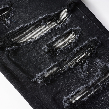 Jean noir à patchs déchirés Amr