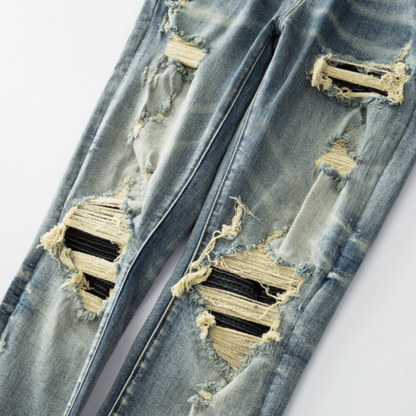 Jean Amr déchiré à patchs