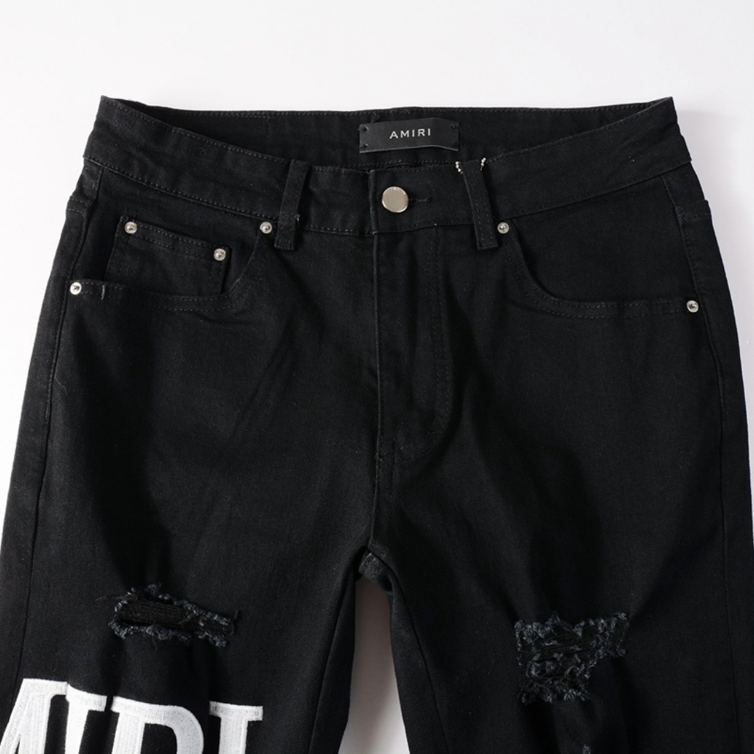 Jean blanc déchiré à logo Amr