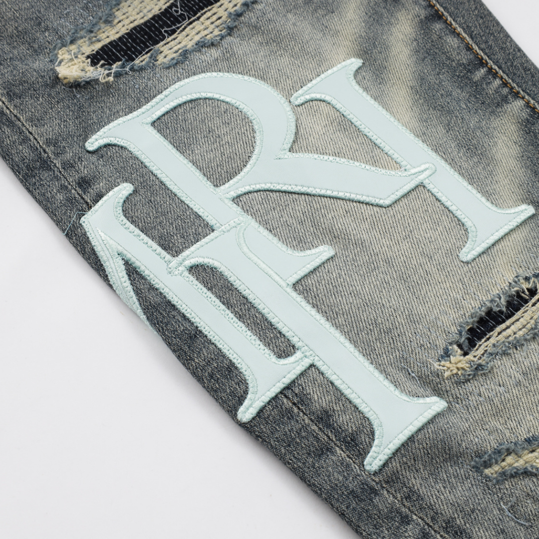 Jean gris-bleu Amr à coupe décalée