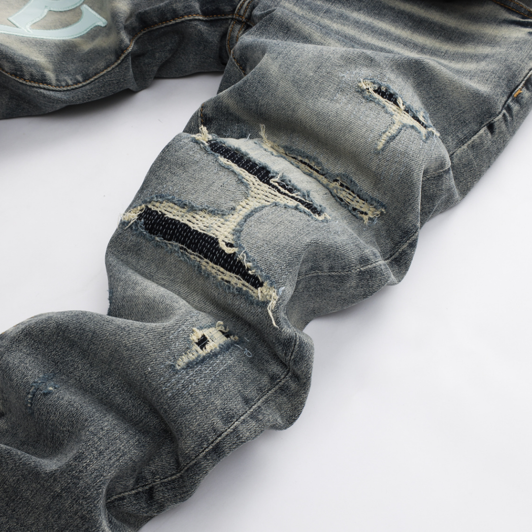 Jean gris-bleu Amr à coupe décalée