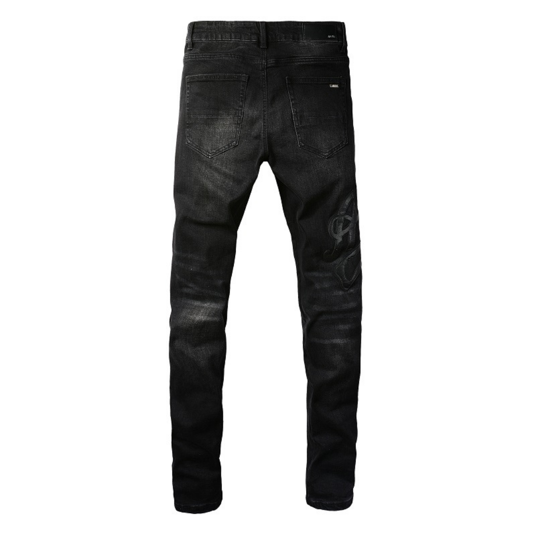 Jean Amr Triple Black Logo