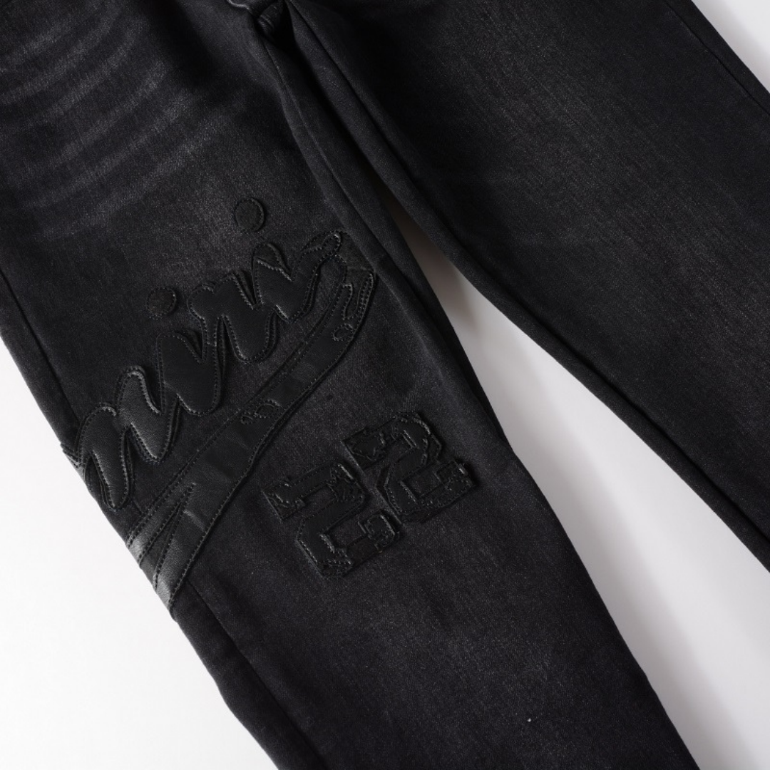 Jean Amr Triple Black Logo