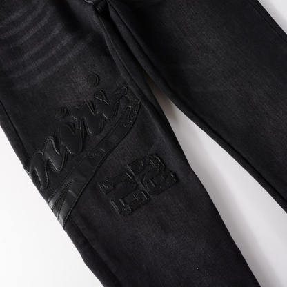 Jean Amr Triple Black Logo