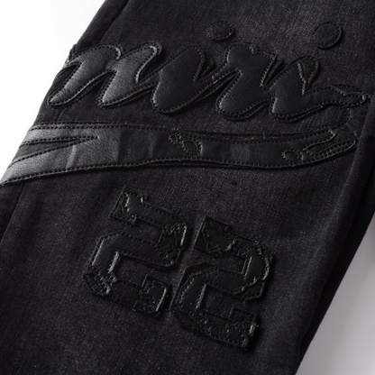Jean Amr Triple Black Logo