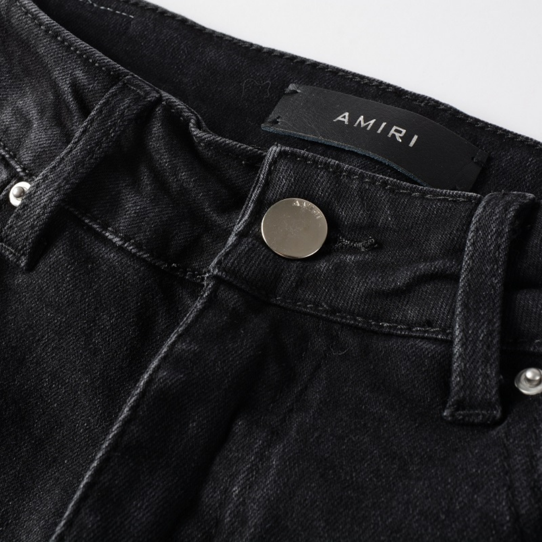 Jean Amr Triple Black Logo