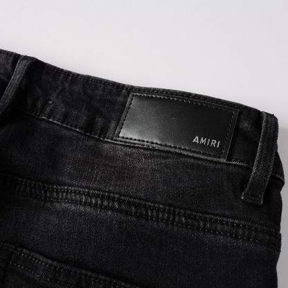 Jean Amr Triple Black Logo