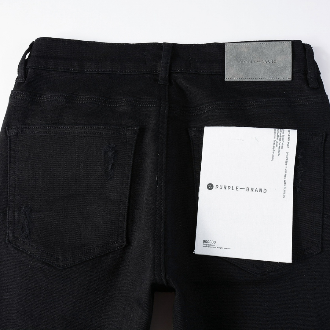 Jean déchiré violet et noir