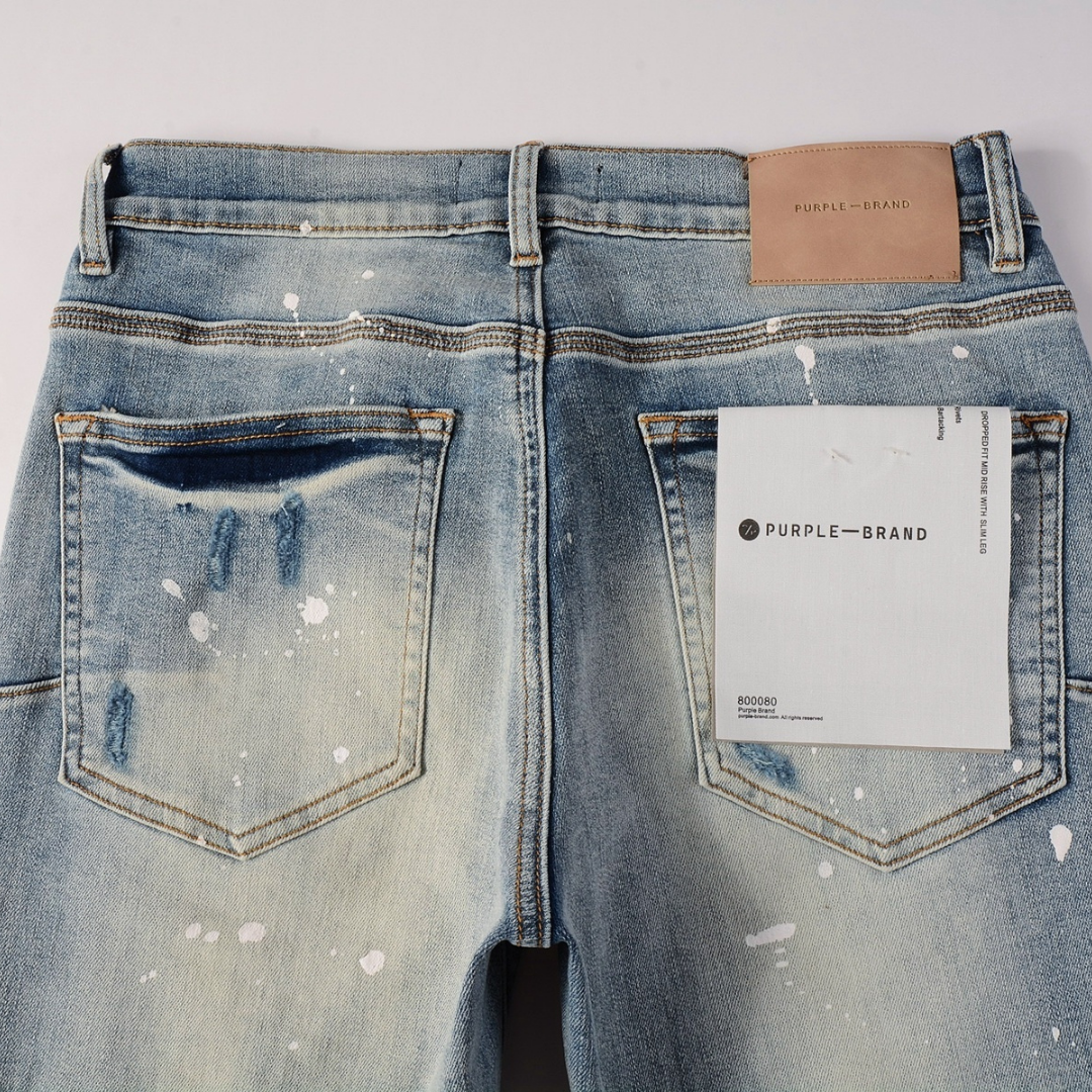 Jean violet dégradé déchiré