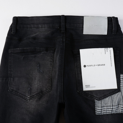 Jean déchiré à monogramme violet