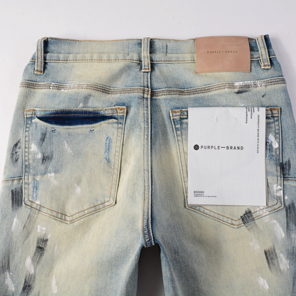 Peinture violette, jeans bleus