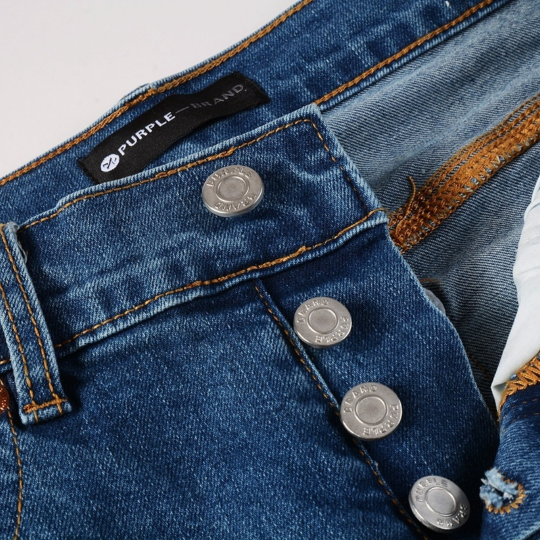 Jean bleu dégradé de peinture violette