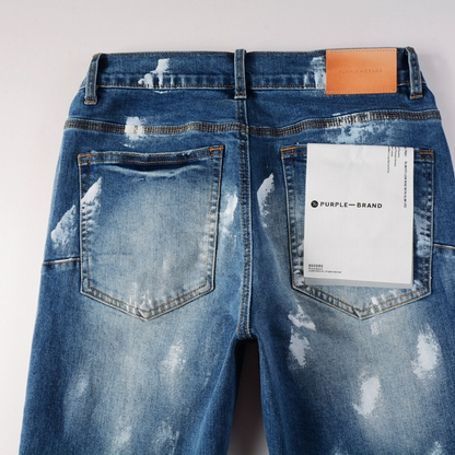 Jean bleu dégradé de peinture violette