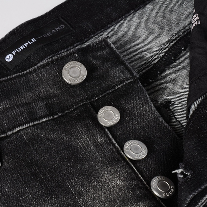 Jean déchiré à la peinture violette