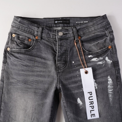 Jean déchiré à la peinture violette