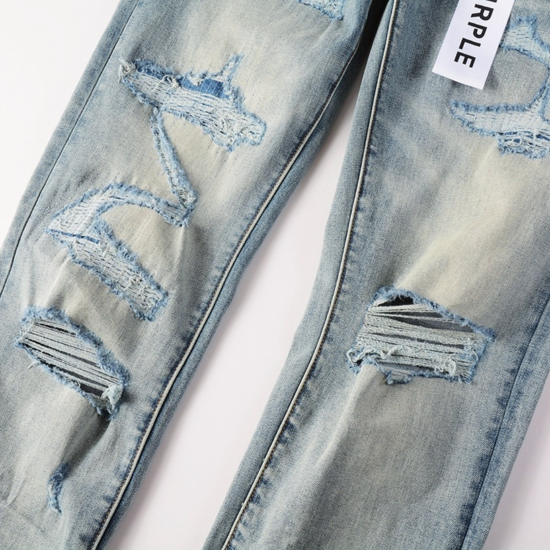 Jean bleu déchiré violet