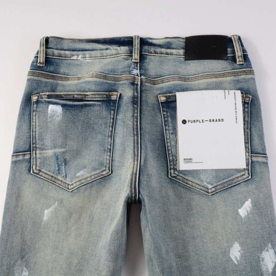 Jean violet déchiré