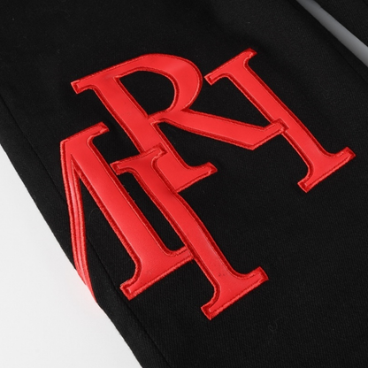 Jean Amr à patch rouge décalé