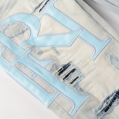 Jean bleu clair Amr à coupe asymétrique