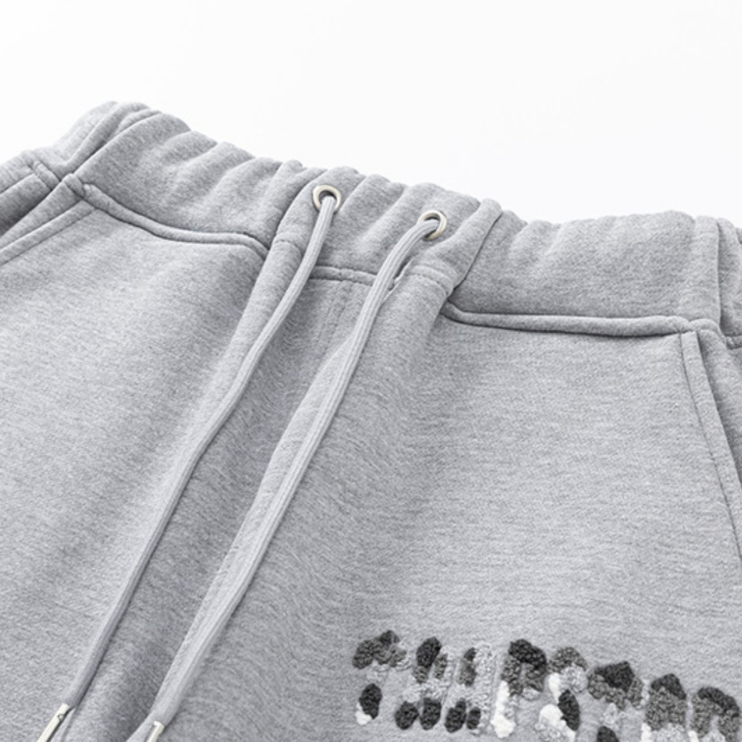 Survêtement gris décodé