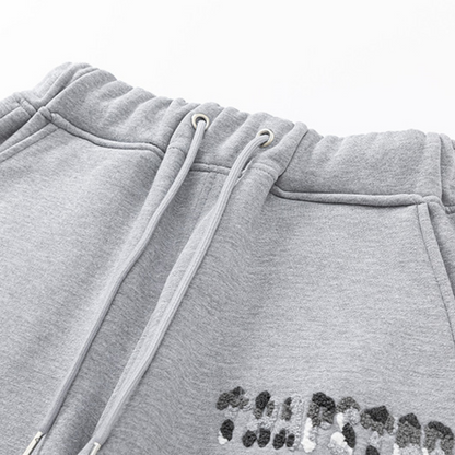 Survêtement gris décodé