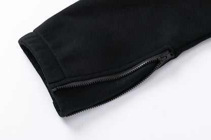 Pantalon noir et orange de tireur