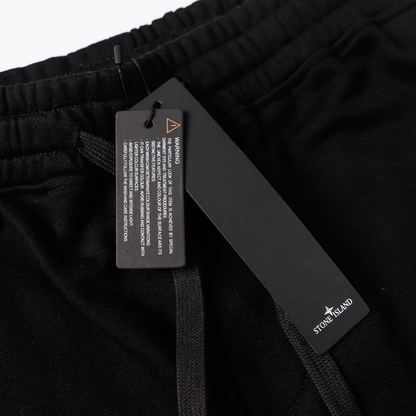 Short à monogramme en pierre