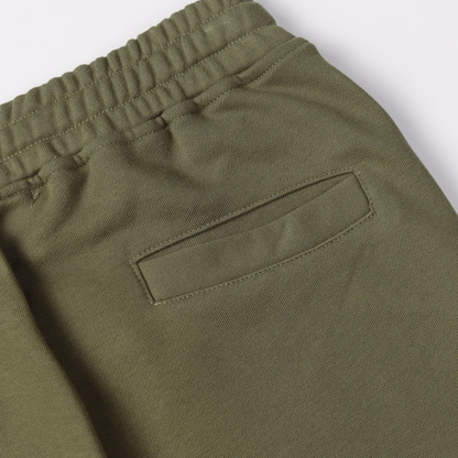 Short à monogramme en pierre