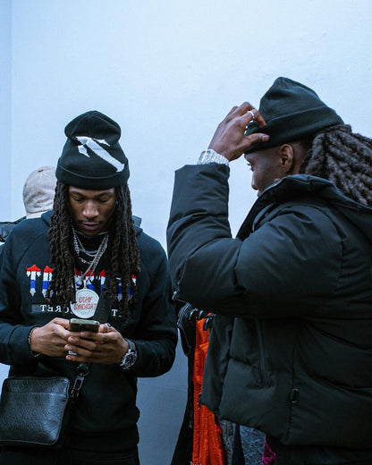 Survêtement noir à secret décodé