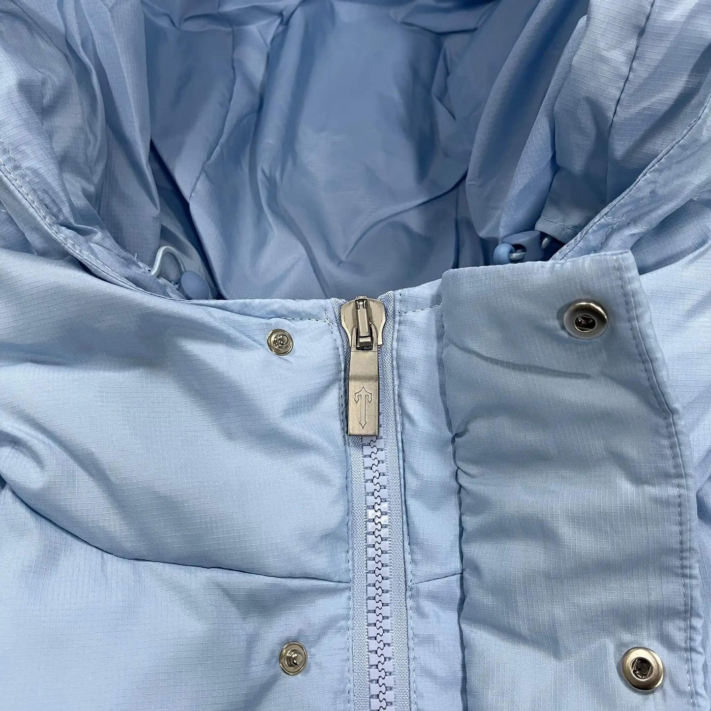 Veste bleue ciel secrète